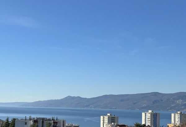Views of the sea and coastline from a balcony, part of an apartment for sale in Rijeka