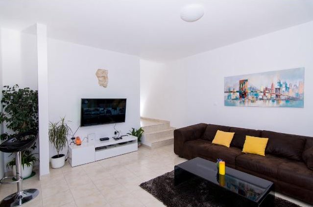 High quality furnished living room of apartment A1338, for sale near Trogir in Croatia.