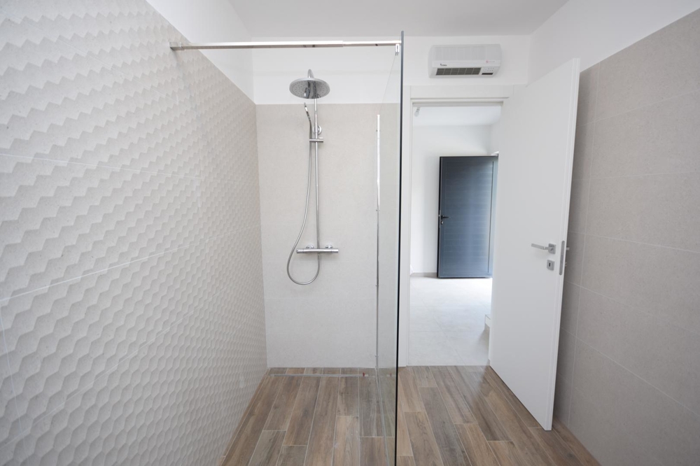 Attractive bathroom with walk-in shower.