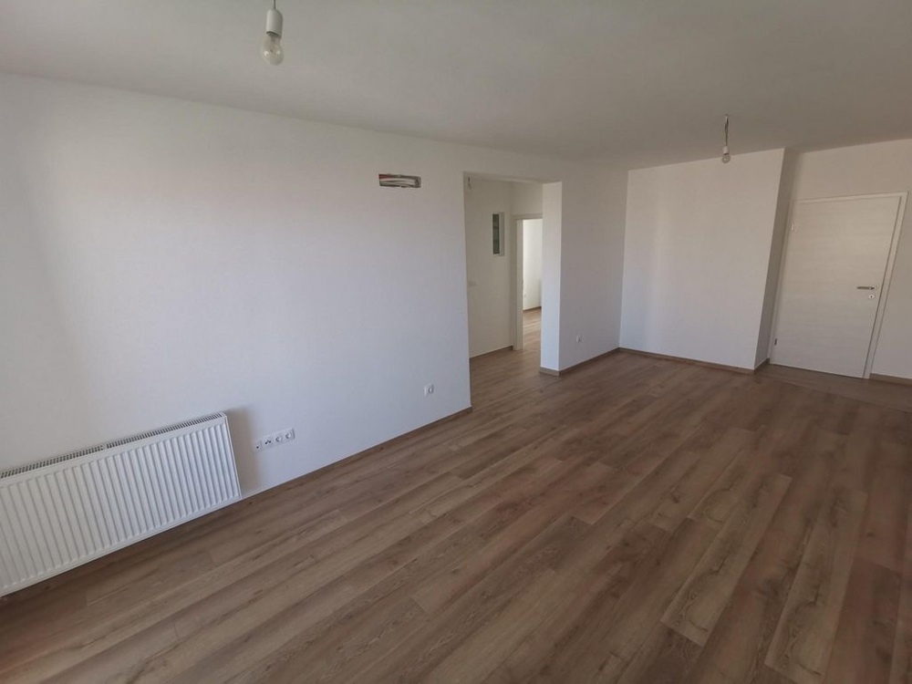 Spacious living area with beautiful parquet flooring of the new apartment A1619 in Crikvenica.