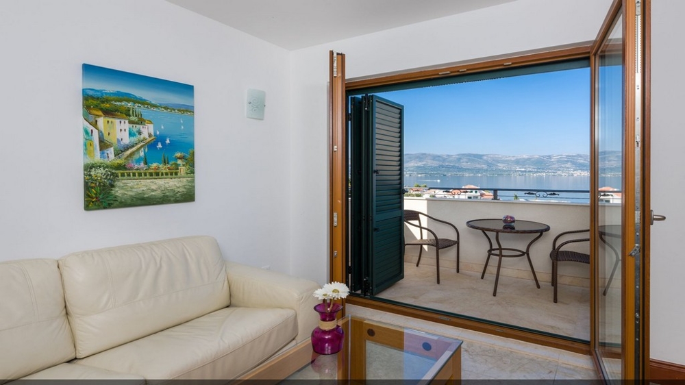 View of the exit to the balcony with sea view - Buy an apartment in Croatia.