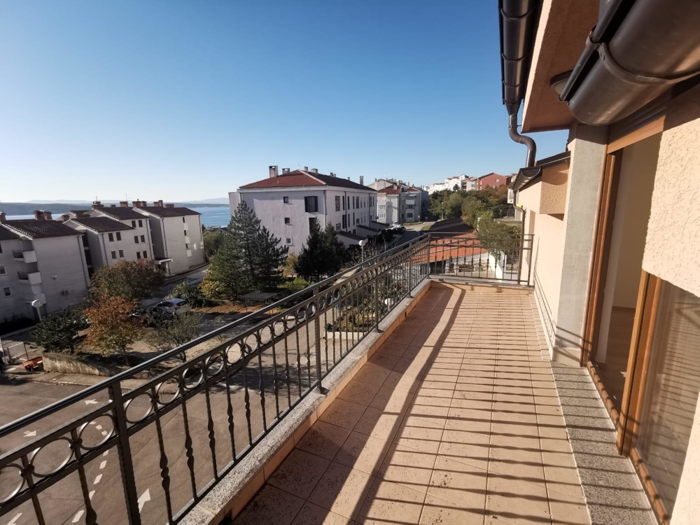View of the balcony, the surroundings and the sea - buy an apartment in Croatia.
