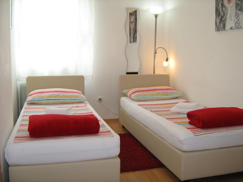 Bedroom with two single beds - Property A2029, Croatia, Senj - Panorama Scouting. – Image 9