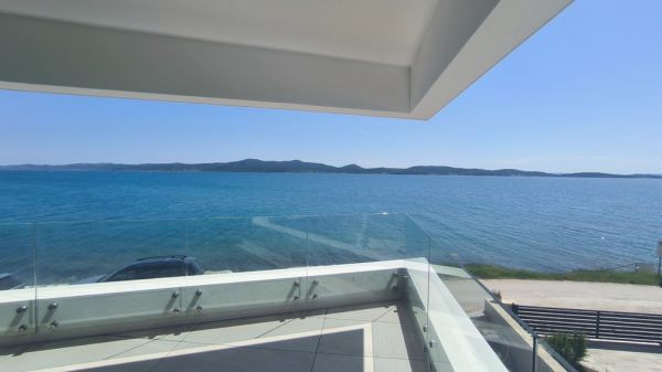 Seafront apartment in new building in Sukosan, Croatia for sale.