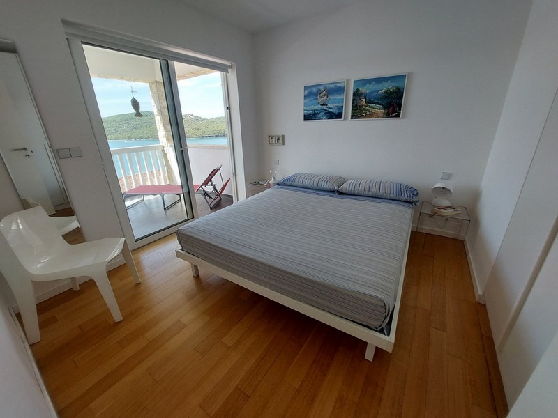 Double bedroom overlooking the sea view terrace.