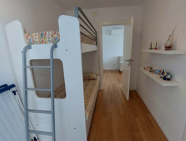Small bedroom / children's room with bunk beds.