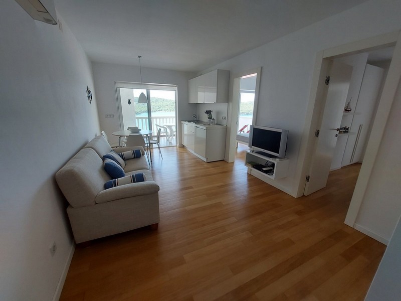 Modernly furnished, bright living area of ​​apartment A3002 in Croatia, Tisno.