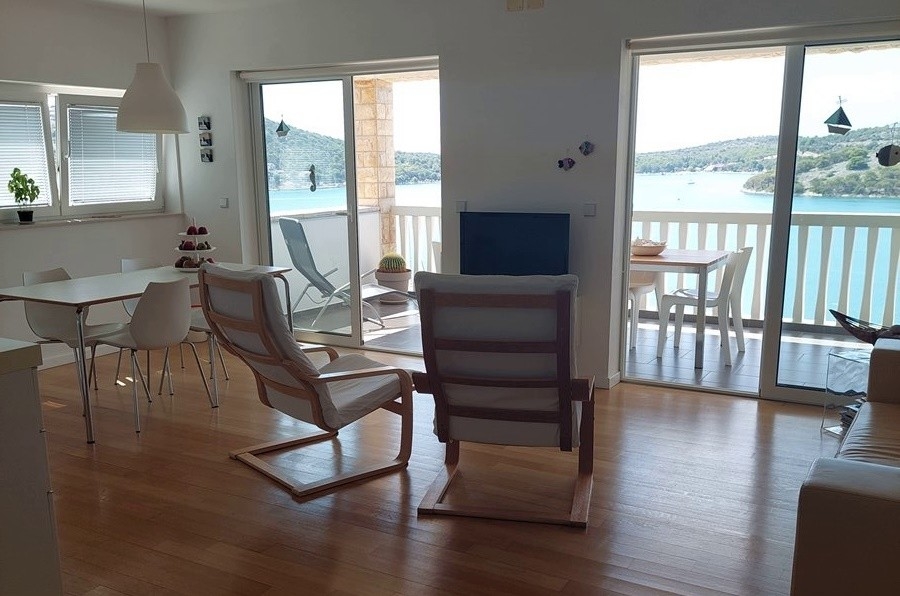 Furnished living room overlooking the sea in Tisno, Croatia - Panorama Scouting A3003.