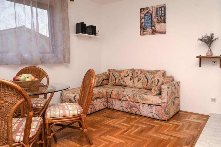 Living room with parquet floor.