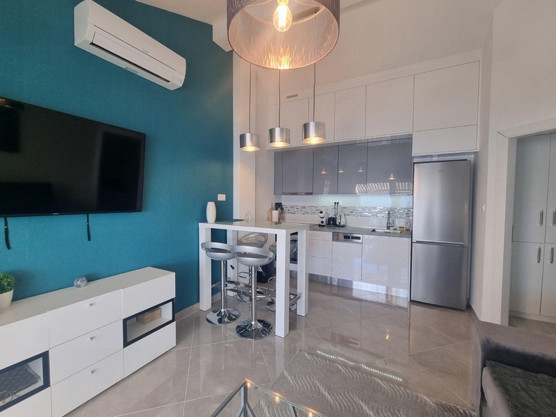 Furnished and modern living room of apartment A3071, offered for sale in Croatia.