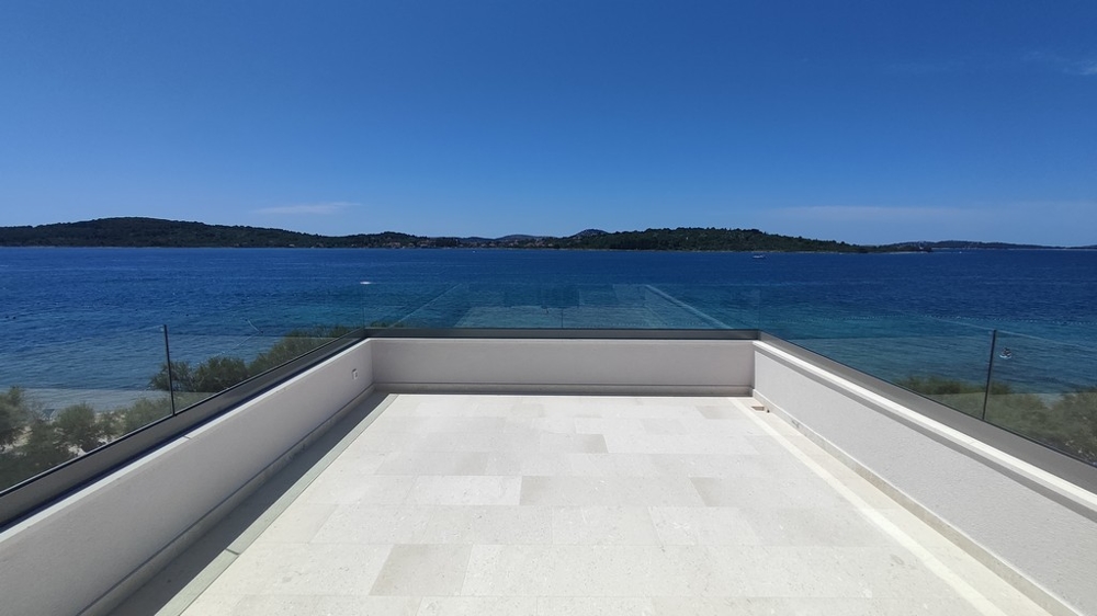 Penthouse for sale Croatia - Elegant, light-filled penthouse with a large terrace and a breathtaking view of the azure sea from Panorama Scouting.