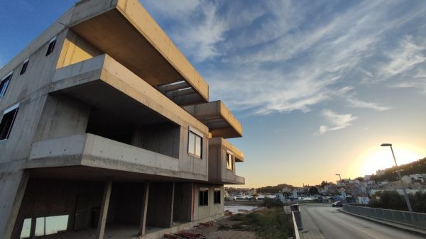 Buy a modern apartment in Tribunj, Croatia - construction progress apartment A3160 with sunset.