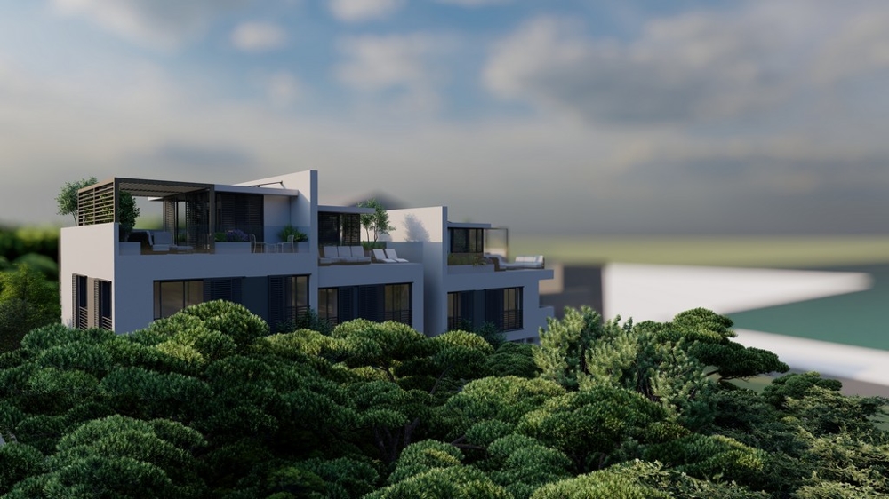 Morning view of a contemporary property in Croatia with a view of green treetops.