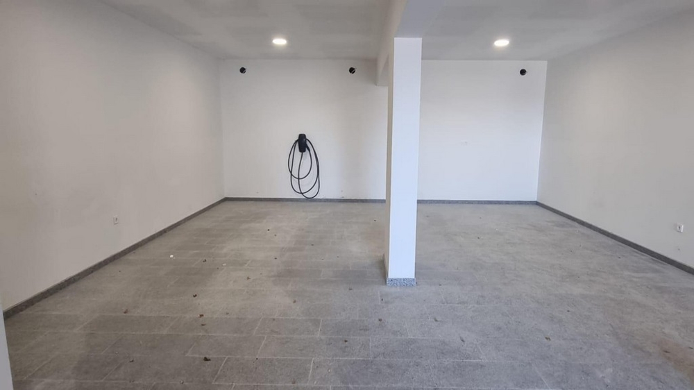 Interior view of an empty garage or storage room with column in the middle in a Croatian property.