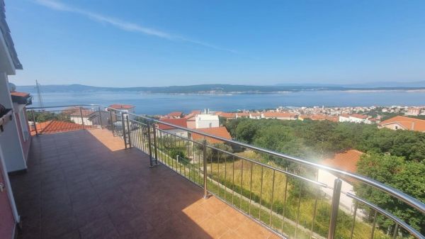 View from the terrace of an apartment for sale in Crikvenica, Croatia, with sea views and clear skies
