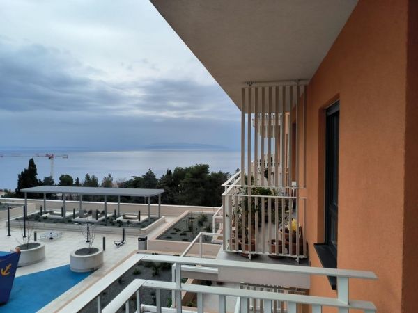 Balcony view in Rijeka, Croatia, apartment for sale with sea view at dusk