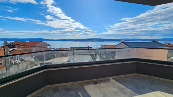 Balcony view of an apartment for sale in Crikvenica, Kvarner Bay, Croatia with sea view and blue sky
