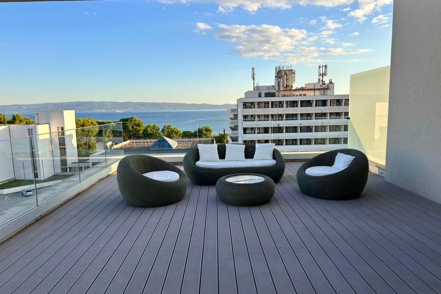 Roof terrace with lounge furniture and sea views in Croatia