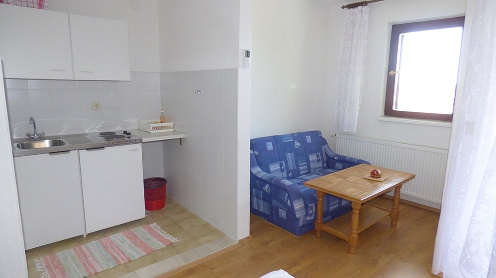 One of the kitchens of the studio apartments