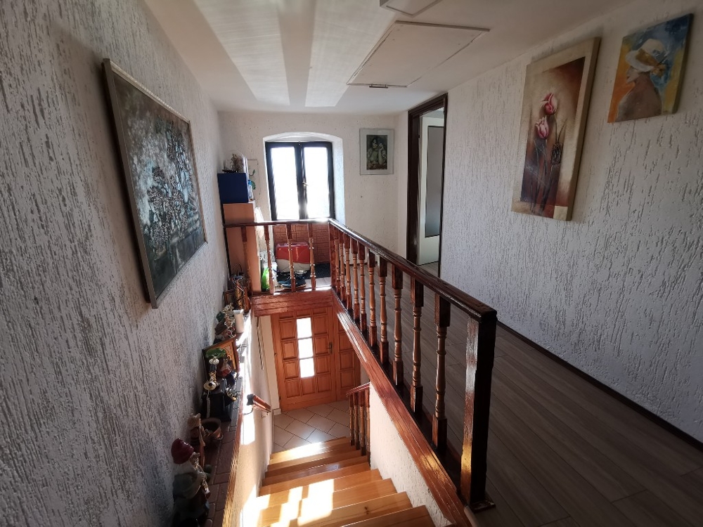 Internal stairs lead to the upper floor of the house.