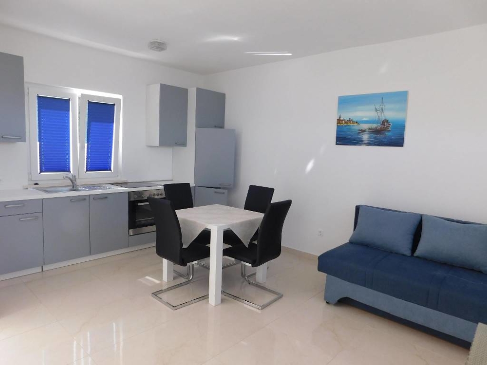 Kitchen and dining area of ​​one of the units.