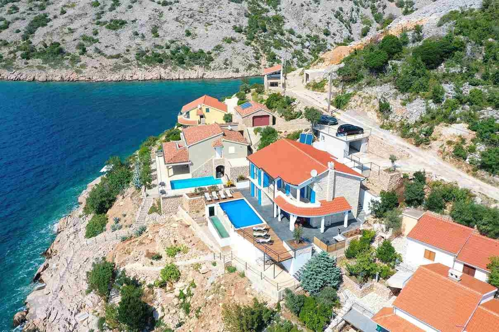 View from the air of the villa and the property directly by the sea in the Kvarner Bay - Buy a villa in Croatia.
