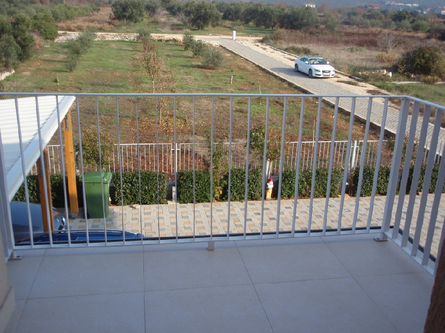 View of the entrance to the plot of Villa H1376 in Croatia.