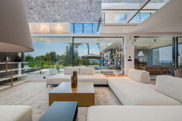 Large open living room overlooking the pool