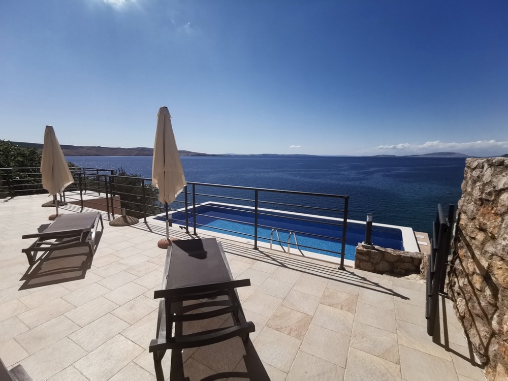 House with swimming pool and panoramic sea view in Croatia at Panorama Scouting Immobilien.