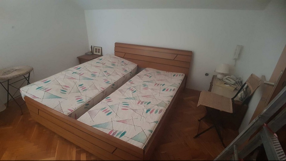 One bedroom of the property with a double bed.