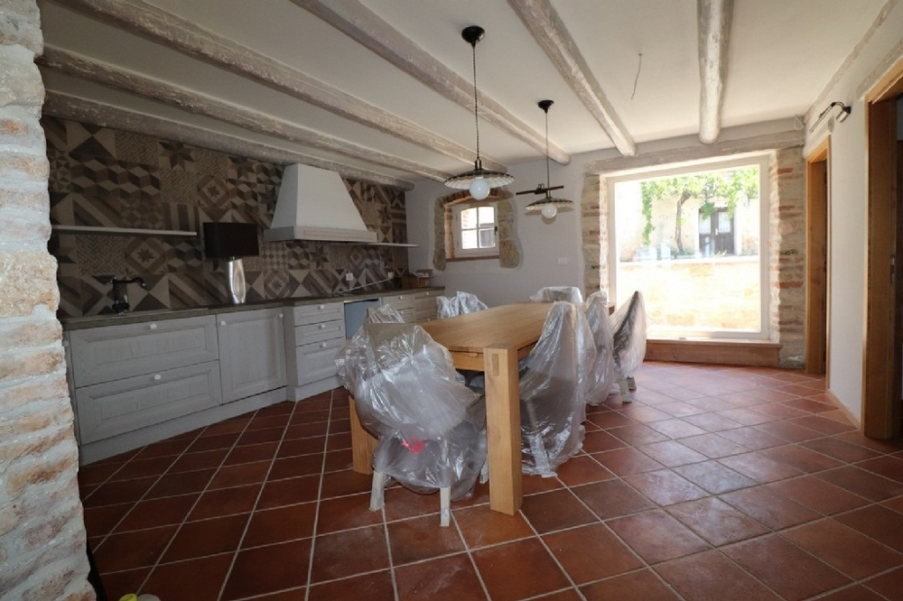 Dining area and kitchen of the house H1508 in Croatia near Porec in the west of the Istrian peninsula.
