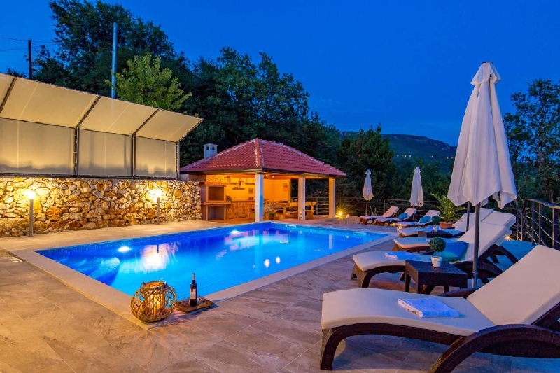 Swimming pool and barbecue area of ​​property H1531, Crikvenica region, Croatia.