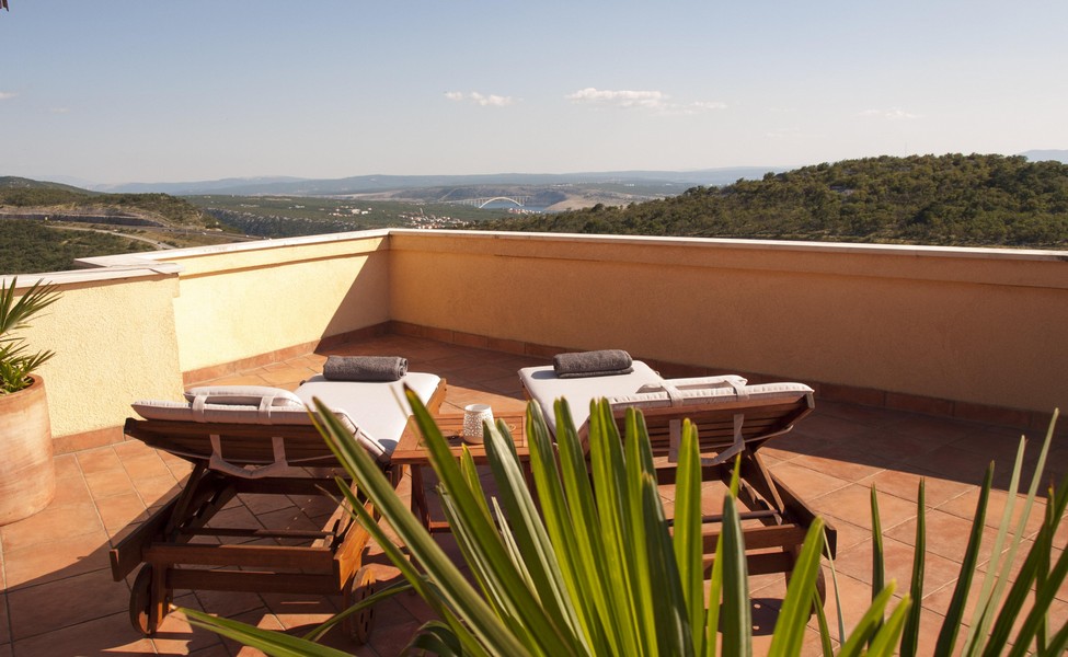 View of the roof terrace with a view of the surroundings and the sea - buy a house in Croatia.
