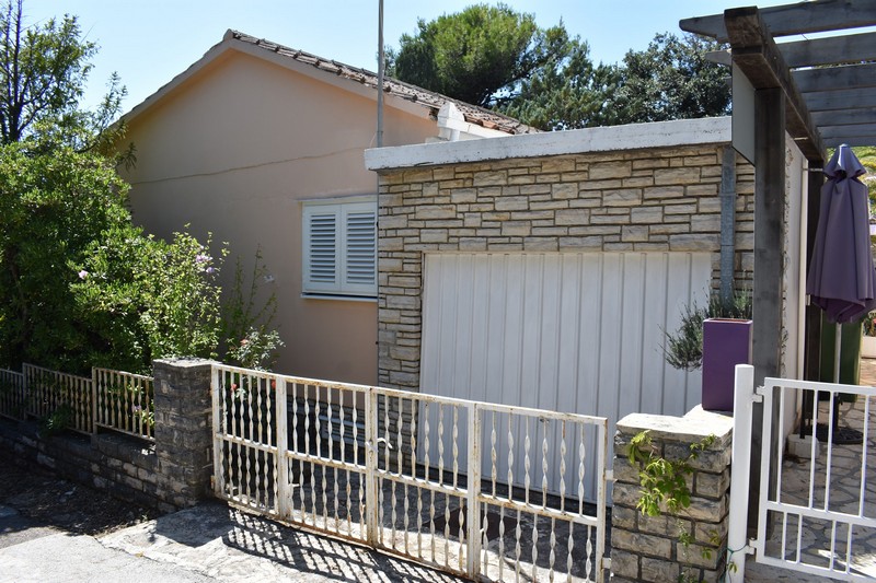 Garage and side view of property H1567 in Zadar region, Croatia.