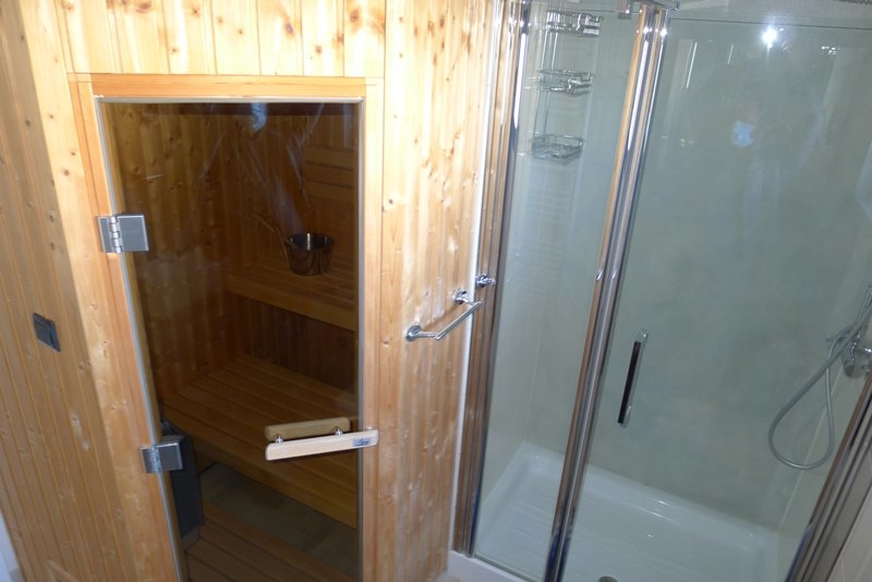 Sauna and an attached shower.