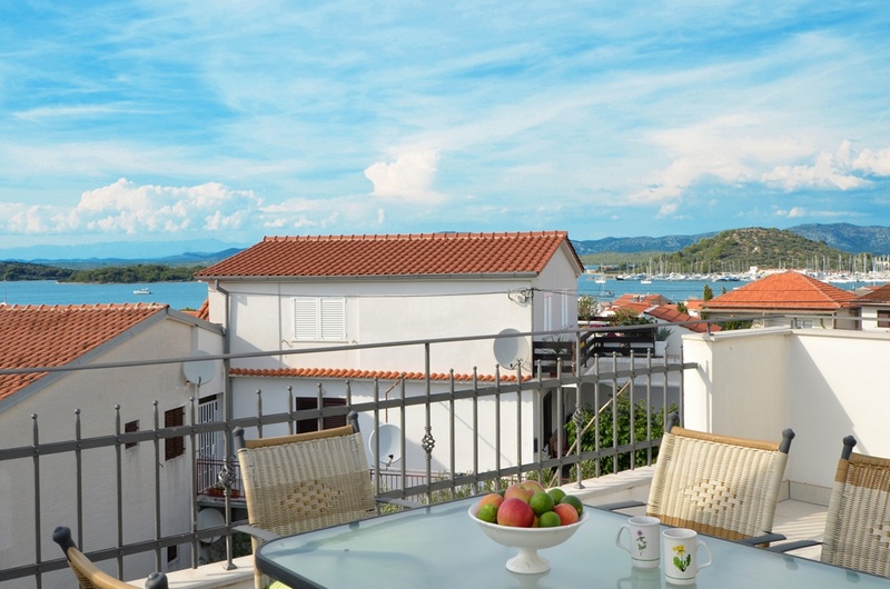 Sea view from the terrace on the upper floor of villa H1757 on Murter in Dalmatia.