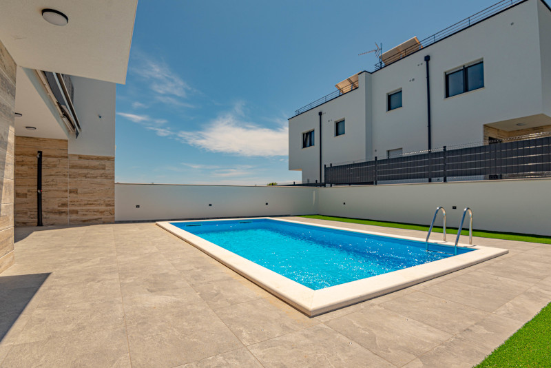 Swimming pool of the house H1775 for sale in Vodice, Croatia.