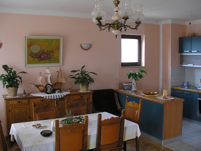Dining area and view of the kitchen.