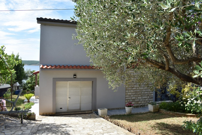 Garage and entrance area - back of house H1818, Posedarje, Croatia.