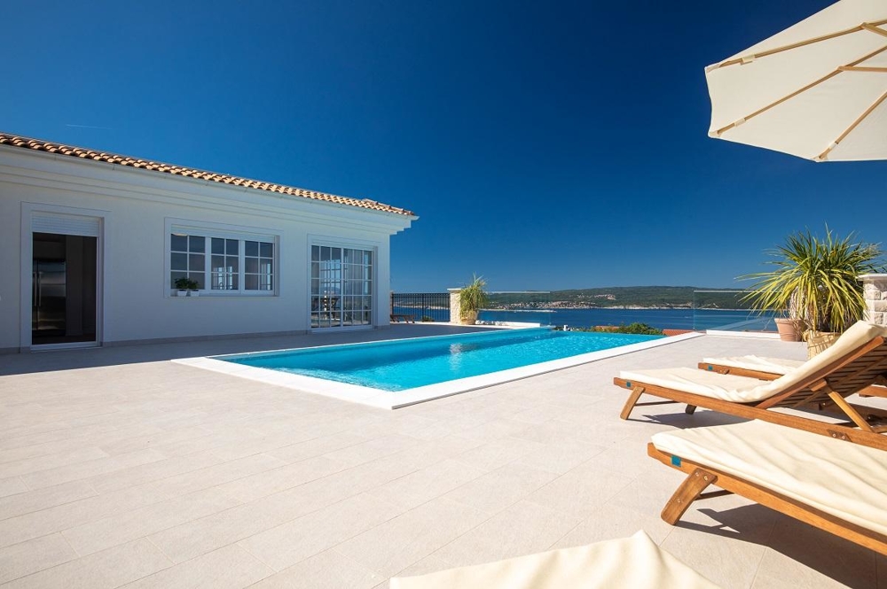 Terrace with infinity swimming pool of Villa H1919 in Crikvenica, Kvarner Bay.
