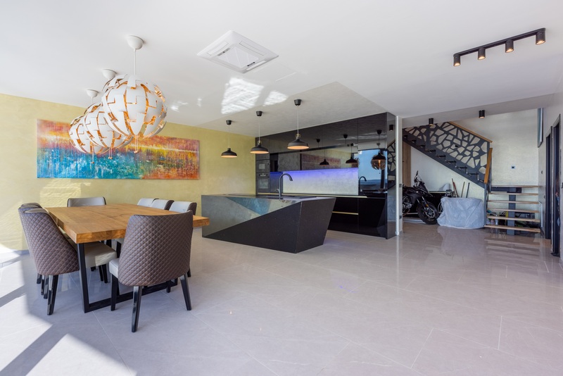 Living area and view of the luxurious kitchen of property H1933 in Crikvenica, Croatia.