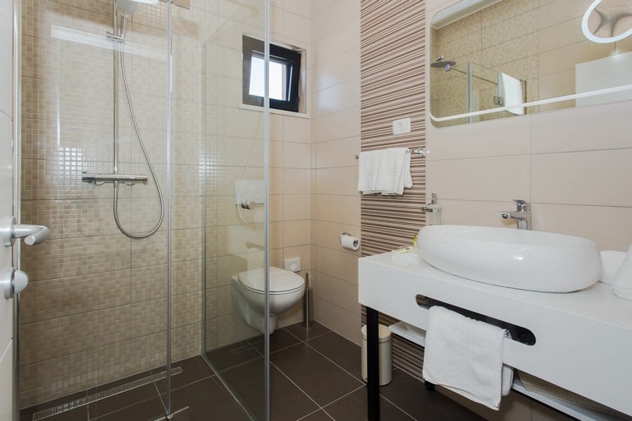 On this picture you can see the attractive and comfortable bathroom of the property H2533 for sale in Ciovo Trogir island.