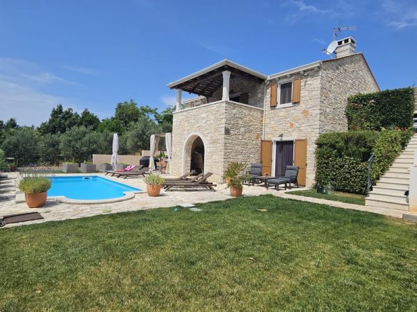 Stone villa with pool and garden