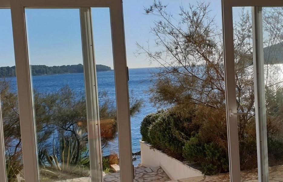 Sea views from the living room through the large glass fronts on the ground floor of the villa.