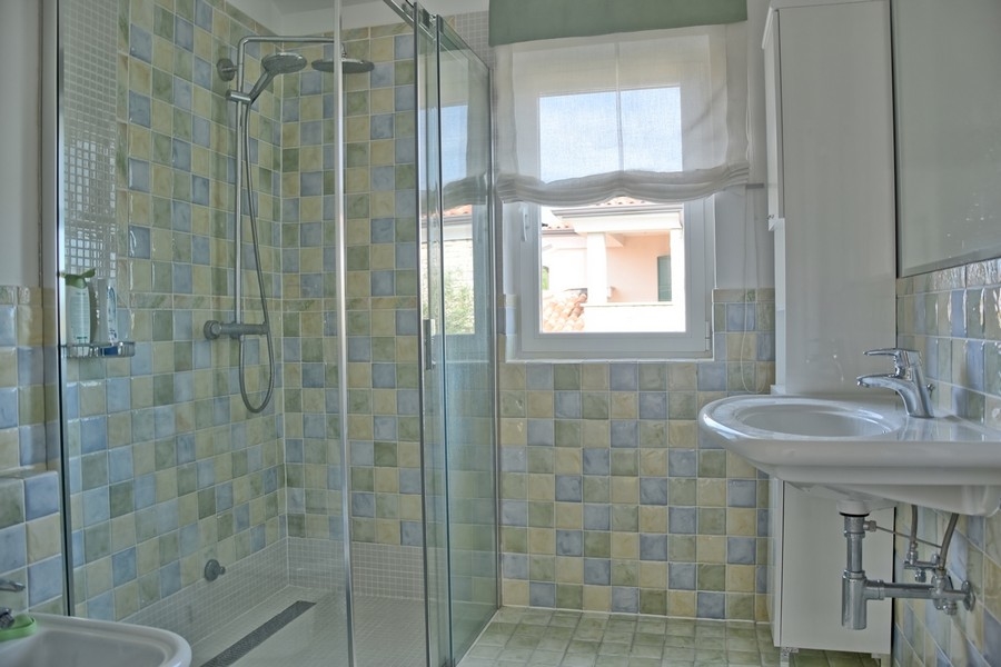Modern bathroom with shower in a house for sale in Istria.