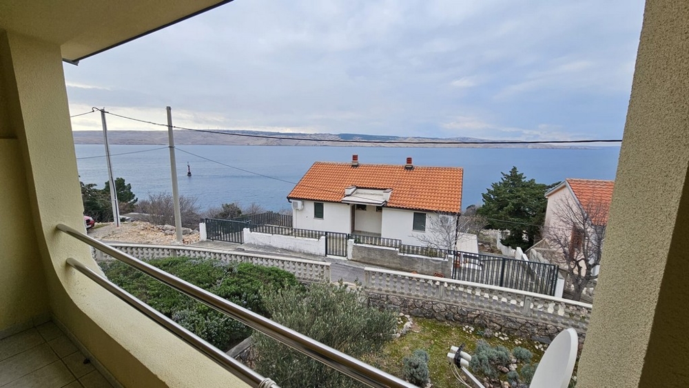 View from the balcony of a house for sale in Karlobag of the sea and coastline