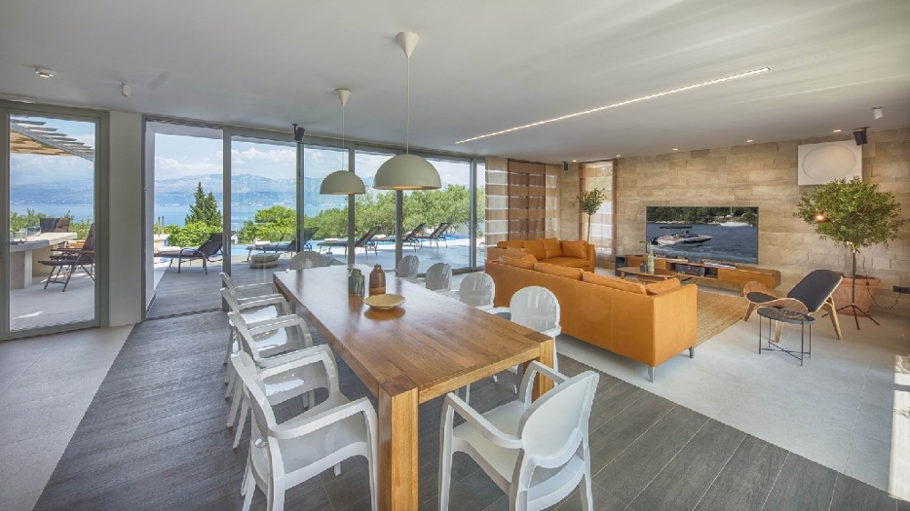 Kitchen and dining area of ​​this modern luxury villa in Croatia, island Brac.