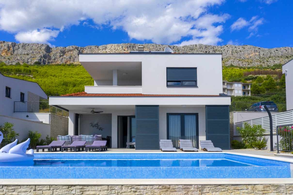 Modern villa with infinity pool near Split in Croatia for sale.